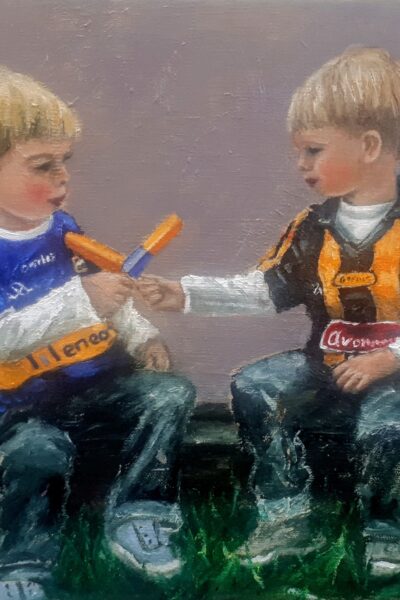 Two boys Tipperary and KILKENNY JERSEYS FIGHTING over ice cream