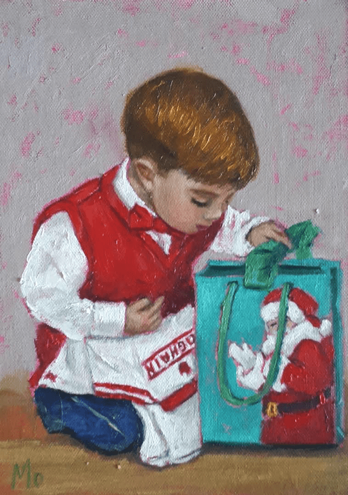 Little Boy looking into a Christmas bag