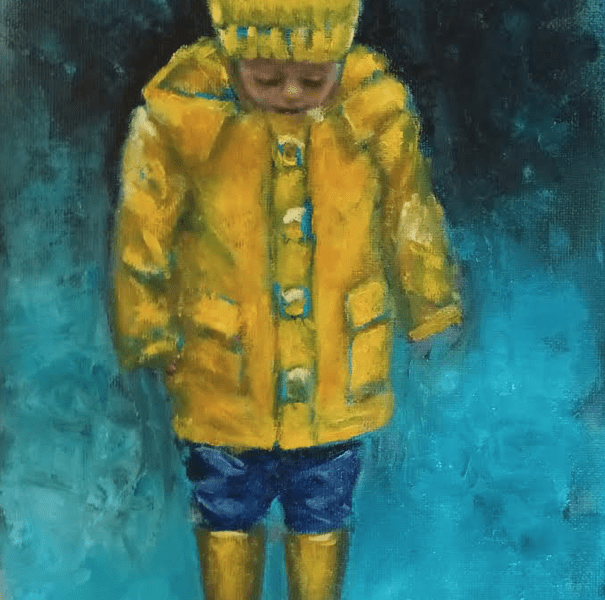 irish gifts little boy in yellow raincoat yellow hat and wellies looking at rubber ducks
