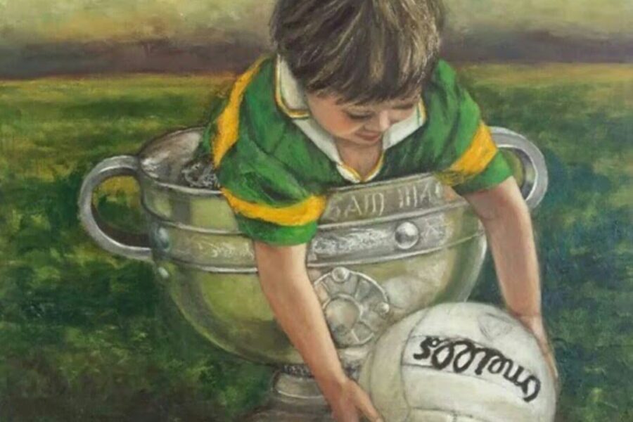 Little boy in the Sam Maguire Cup picking up a football irish gifts Irish Art