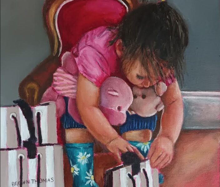 Daisy boots Irish Art Little girl wearing wellies looking into a Brown Thomas bag